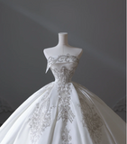 Elegant floor-length white strapless satin wedding dress with sparkling beads HZ1022