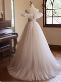 Elegant and flowing white strapless tulle beaded A-line wedding dress HZ1022