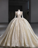 Gorgeous golden V-neck padded shoulder design long sleeve lace totem crystal sewn beads fluffy floor-length wedding dress HZ1022