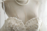 Princess one-shoulder palace irregular pleated lace hemming handmade flower pieces beaded floor-length wedding dress HZ1022