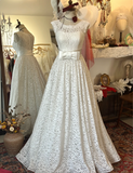 French lace round neck bow waist A-line elegant wedding dress HZ1022