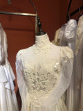 Vintage Champagne High Neck Lace Long Sleeve Buttoned Satin Floor-Length Wedding Dress HZ1022